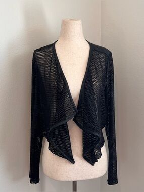Arden B Black cardigan with ruffle details. Size: S